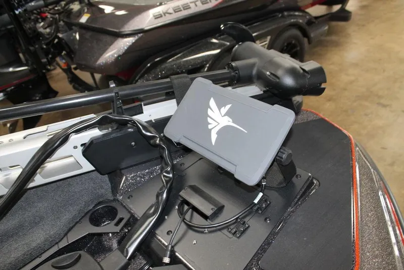 Slide: The Image of 2026 Skeeter ZXE21 boat interior with advanced control panel and sleek design. - 5