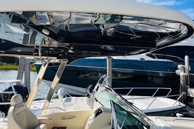 Slide: The Image of 2022 Chris-Craft Calypso 30 boat with sleek design and luxurious seating. - 12