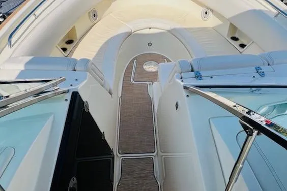 Slide: The Image of 2022 Chris-Craft Calypso 30 boat interior with luxurious seating and sleek design. - 18