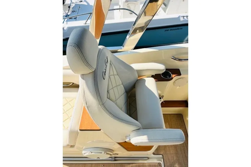 Slide: The Image of Luxurious seating on 2022 Chris-Craft Calypso 30 boat, featuring elegant design and comfort. - 32