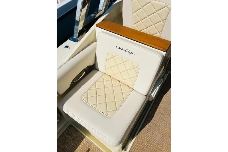 Slide: The Image of Luxurious seating on 2022 Chris-Craft Calypso 30 boat with quilted upholstery. - 33