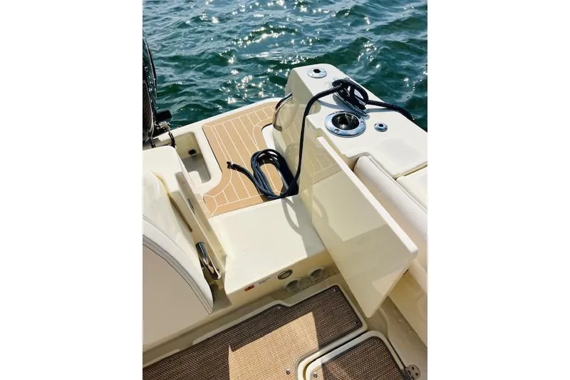 Slide: The Image of 2022 Chris-Craft Calypso 30 boat deck with seating and water view. - 34