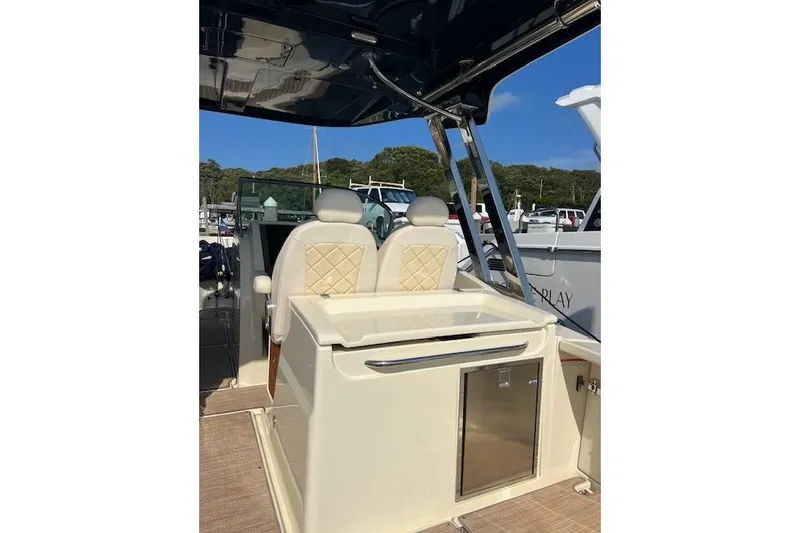 Slide: The Image of 2022 Chris-Craft Calypso 30 boat interior with luxury seating and sleek design. - 35