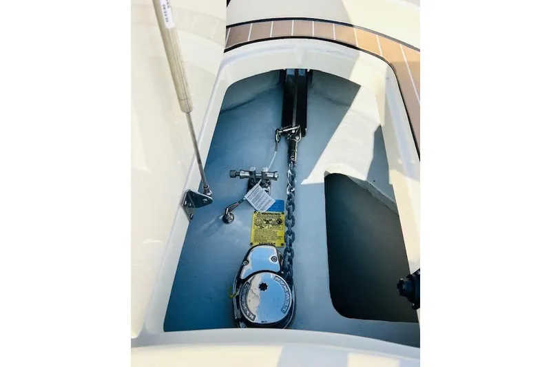 Slide: The Image of 2022 Chris-Craft Calypso 30 anchor locker with chain and winch system. - 37