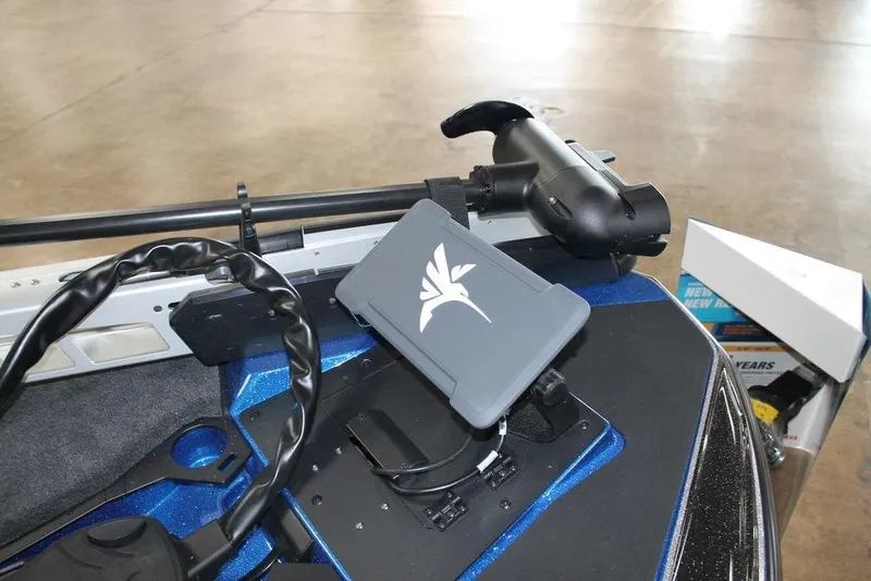 Slide: The Image of 2026 Skeeter ZXE20 boat dashboard with mounted electronic device and controls. - 5