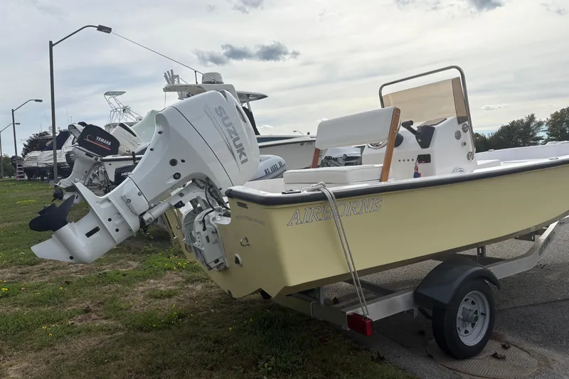 Slide: The Image of 2024 Wolfeboro 15 Classic boat with Suzuki outboard motor on trailer. - 3