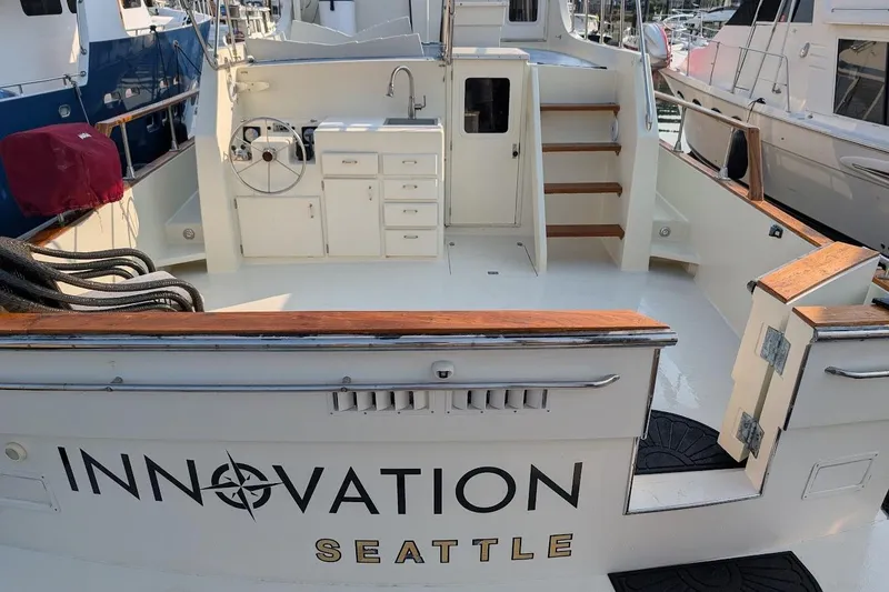 Slide: The Image of 1978 Tollycraft 54 Custom Cockpit Motor Yacht, "Innovation" docked in Seattle marina. - 12
