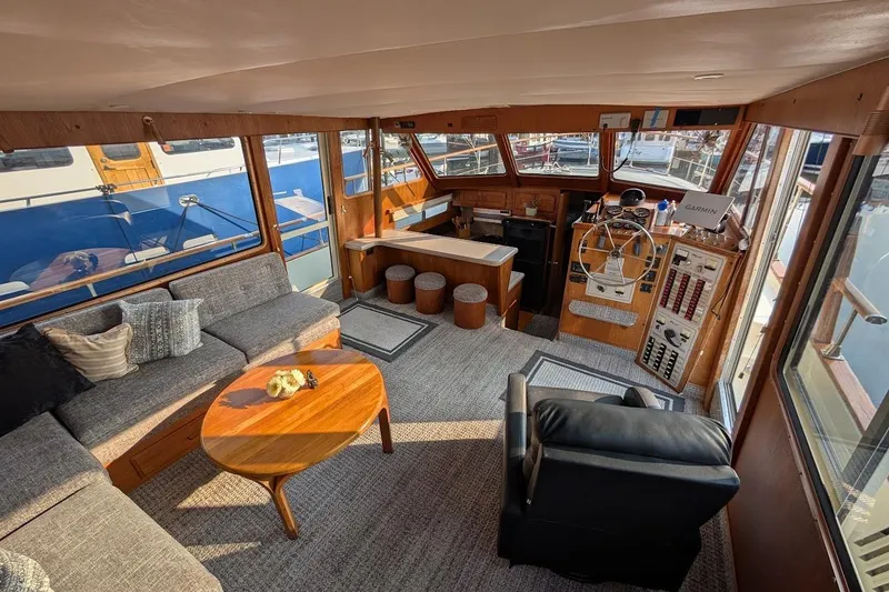 Slide: The Image of Interior of 1978 Tollycraft 54 Custom Cockpit Motor Yacht with helm and seating area. - 15