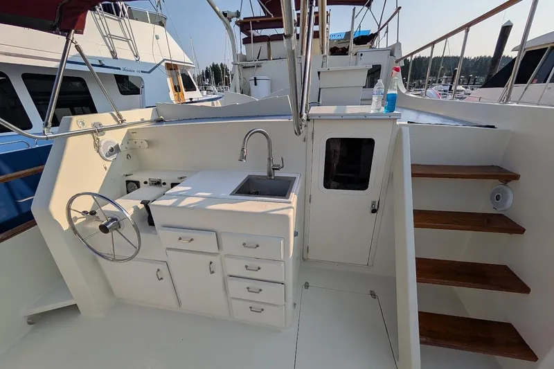 Slide: The Image of 1978 Tollycraft 54 Custom Cockpit Motor Yacht with outdoor sink and steering wheel. - 42