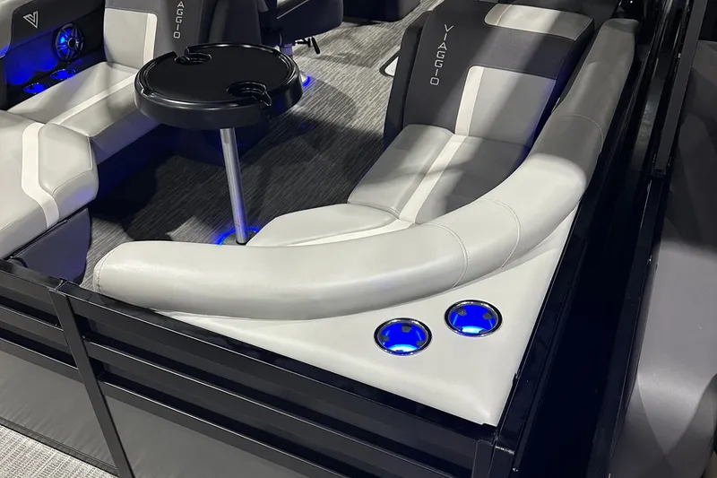 Slide: The Image of Luxurious seating area in 2026 Viaggio Lago X22U boat with LED cup holders and table. - 17