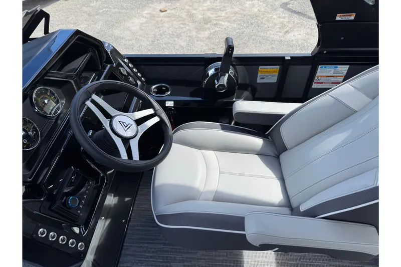 Slide: The Image of Captain's seat and steering wheel of 2026 Viaggio Lago X22U boat. - 19