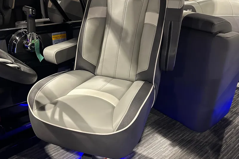 Slide: The Image of Captain's seat in 2026 Viaggio Lago X22U boat, featuring sleek design and modern controls. - 26