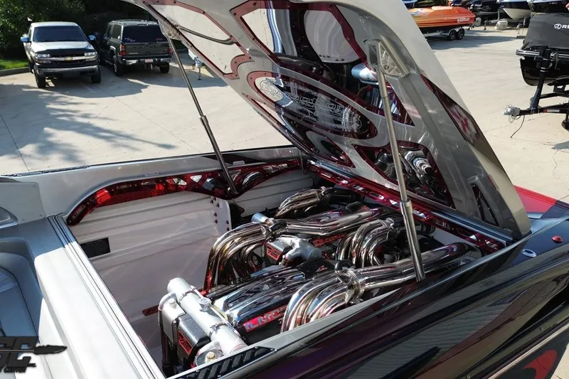 Slide: The Image of 2011 Sunsation F-4 boat engine compartment with polished chrome components. - 34
