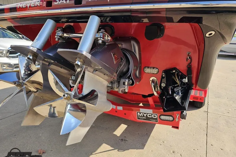 Slide: The Image of 2011 Sunsation F-4 boat with dual propellers and Myco trailer, rear view. - 36