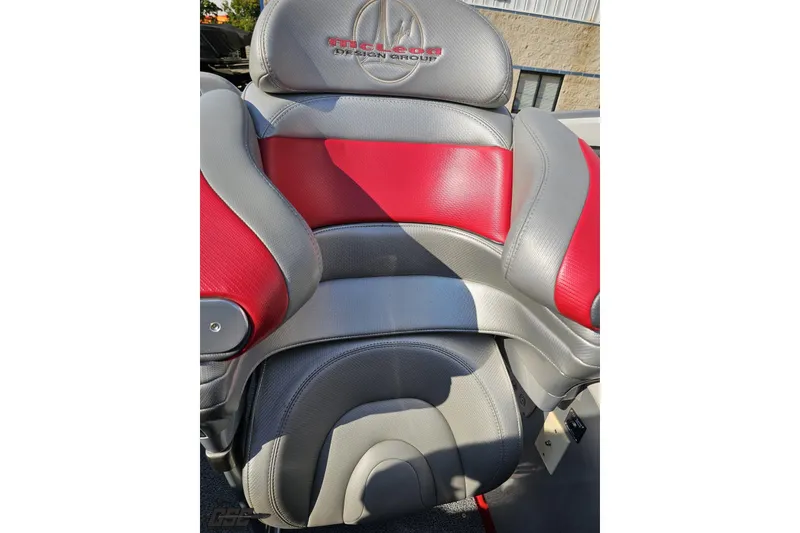 Slide: The Image of 2011 Sunsation F-4 boat seat with red and gray upholstery design. - 89