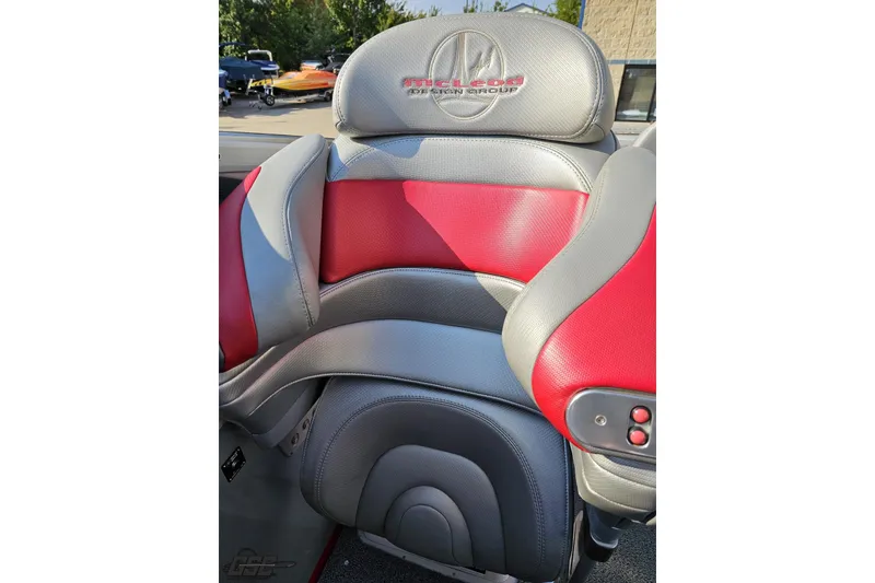 Slide: The Image of 2011 Sunsation F-4 boat seat with red and gray upholstery, featuring embroidered logo. - 91