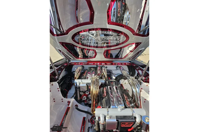 Slide: The Image of Engine compartment of a 2011 Sunsation F-4 boat with polished components. - 96