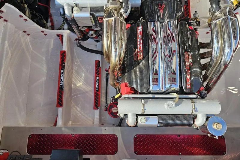 Slide: The Image of Engine compartment of a 2011 Sunsation F-4 boat featuring Ilmor components. - 98