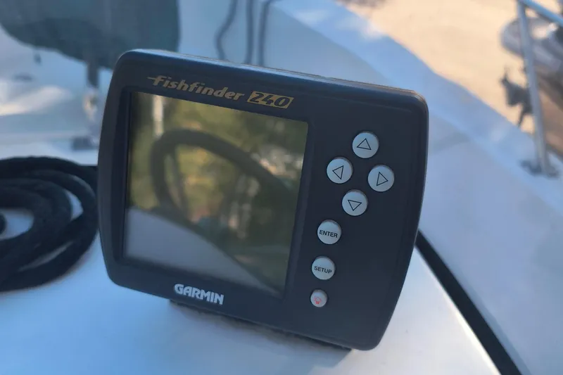 Slide: The Image of Garmin Fishfinder 240 on 2002 Boston Whaler 180 Dauntless boat deck. - 11
