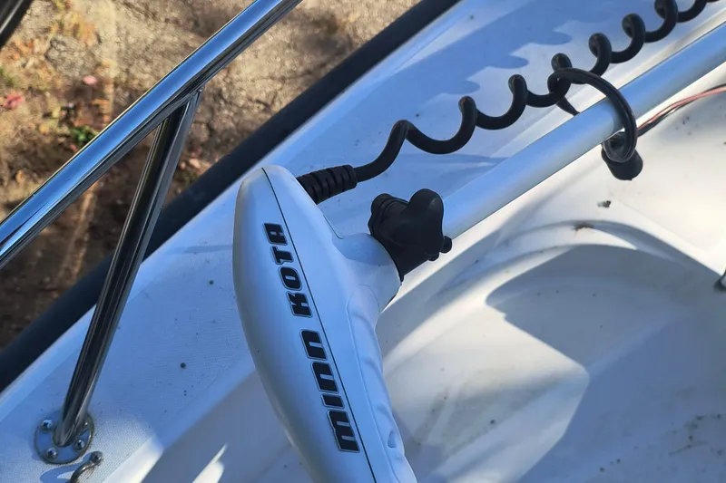 Slide: The Image of Minn Kota trolling motor on 2002 Boston Whaler 180 Dauntless boat. - 14