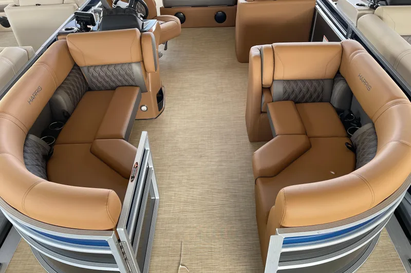 The Image of 2026 Harris Cruiser 210 interior with tan seating and modern design. - 0