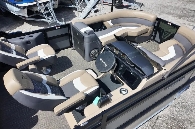 Slide: The Image of 2026 Viaggio Diamante D22S pontoon boat interior with luxurious seating and modern dashboard. - 11
