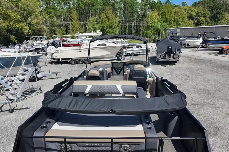 Slide: The Image of 2026 Viaggio Diamante D22S boat in a marina with other vessels. - 8