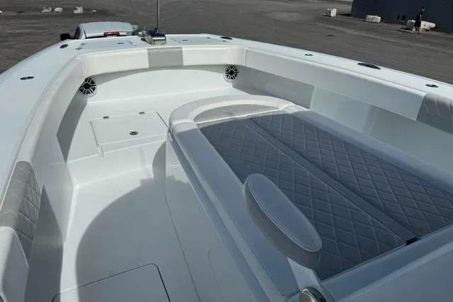 Slide: The Image of 2022 Freeman 37 VH boat interior with cushioned seating and sleek design. - 20