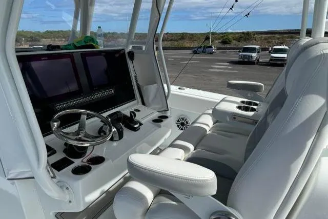 Slide: The Image of 2022 Freeman 37 VH boat interior with modern dashboard and comfortable seating. - 23