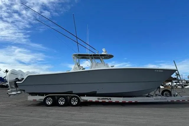 Slide: The Image of 2022 Freeman 37 VH boat on trailer under blue sky. - 29