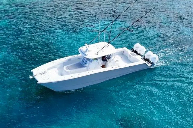 Slide: The Image of Aerial view of 2022 Freeman 37 VH boat on clear blue water. - 35