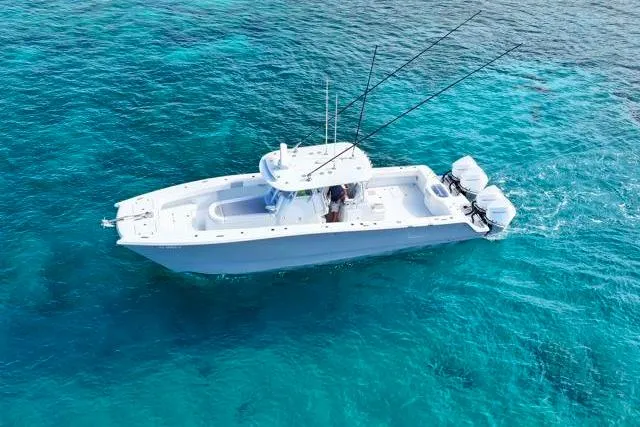 Slide: The Image of Aerial view of 2022 Freeman 37 VH boat on clear blue water. - 36