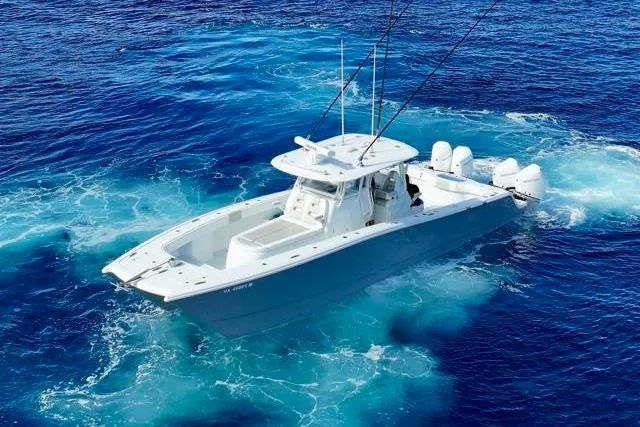 Slide: The Image of 2022 Freeman 37 VH boat cruising in vibrant blue ocean waters. - 5