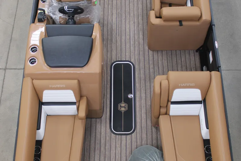 Slide: The Image of Interior view of 2026 Harris Solstice 230 boat with tan seating and sleek design. - 11