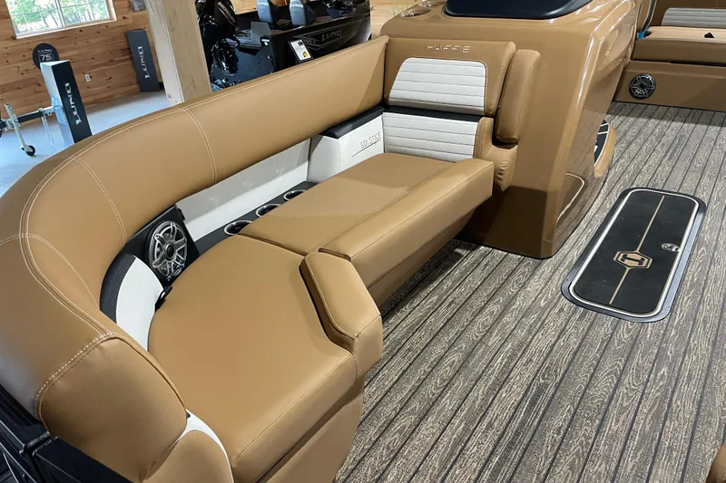 Slide: The Image of Luxurious seating on 2026 Harris Solstice 230 boat with tan upholstery and modern design. - 5