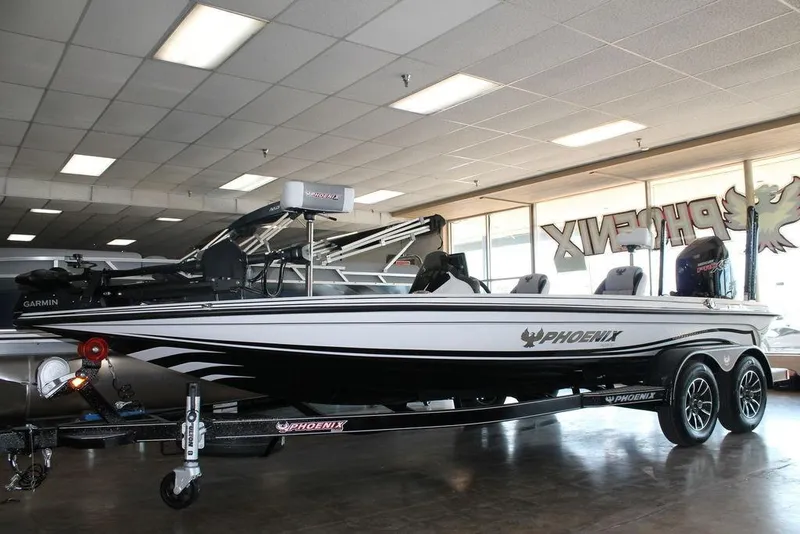 The Image of 2026 Phoenix 721 ZXL boat in showroom, featuring sleek design and advanced equipment. - 1