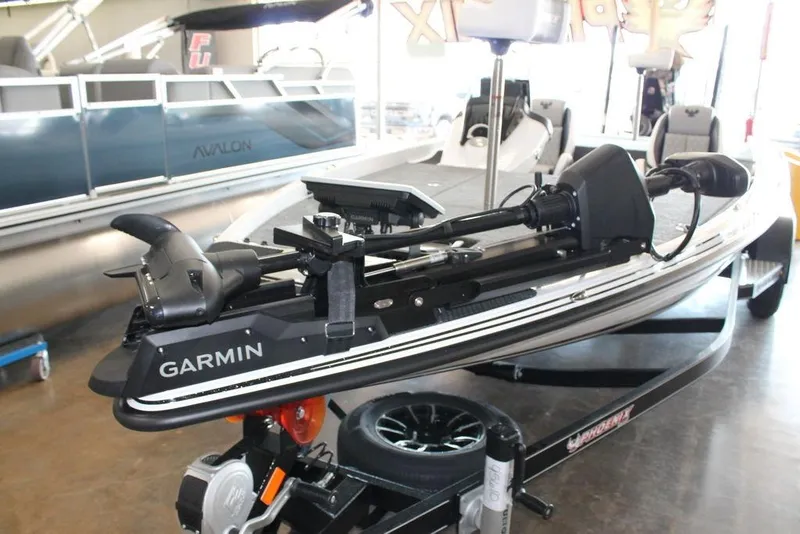 Slide: The Image of 2026 Phoenix 721 ZXL boat with Garmin equipment in showroom. - 10