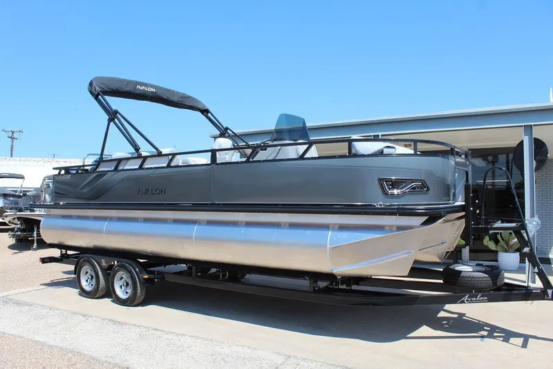 Slide: The Image of 2026 Avalon Venture 85 Center Console Fish boat, 23 feet, on trailer, sleek design. - 1