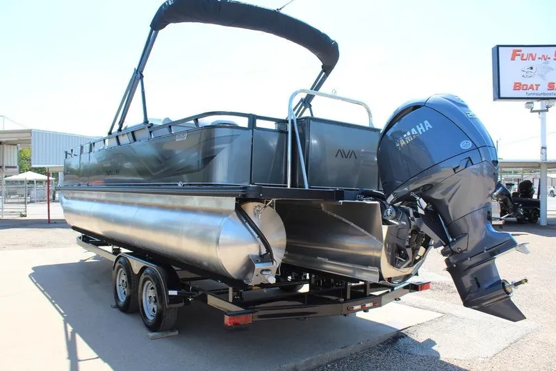 Slide: The Image of 2026 Avalon Venture 85 Center Console Fish boat on trailer, featuring Yamaha outboard motor. - 11