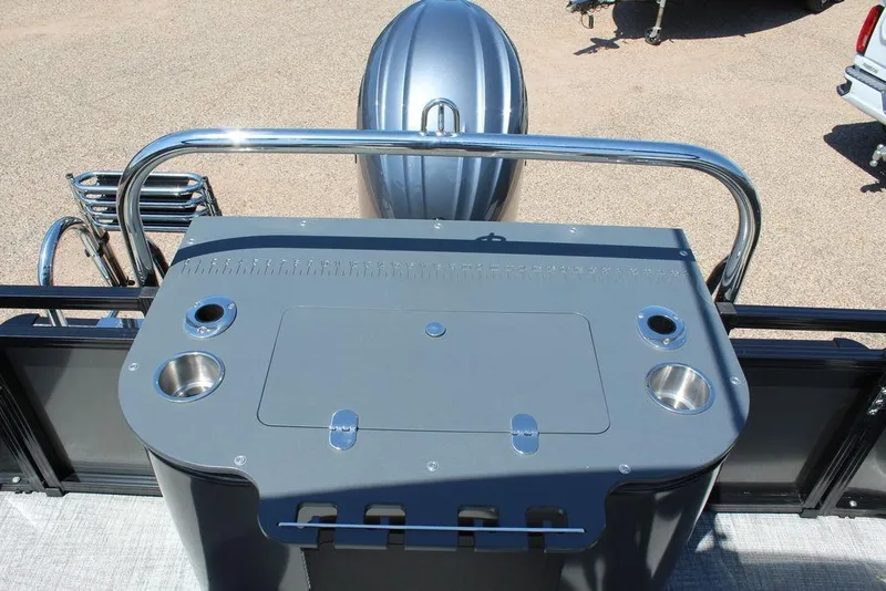 Slide: The Image of 2026 Avalon Venture 85 Center Console Fish boat with sleek console design and cup holders. - 12