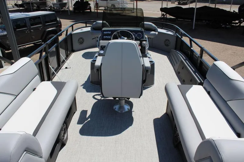 Slide: The Image of 2026 Avalon Venture 85 Center Console Fish boat interior with seating and steering console. - 14