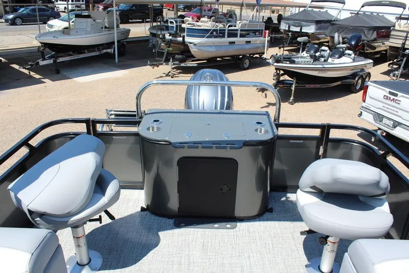 Slide: The Image of 2026 Avalon Venture 85 Center Console Fish boat interior with seating and control panel. - 18