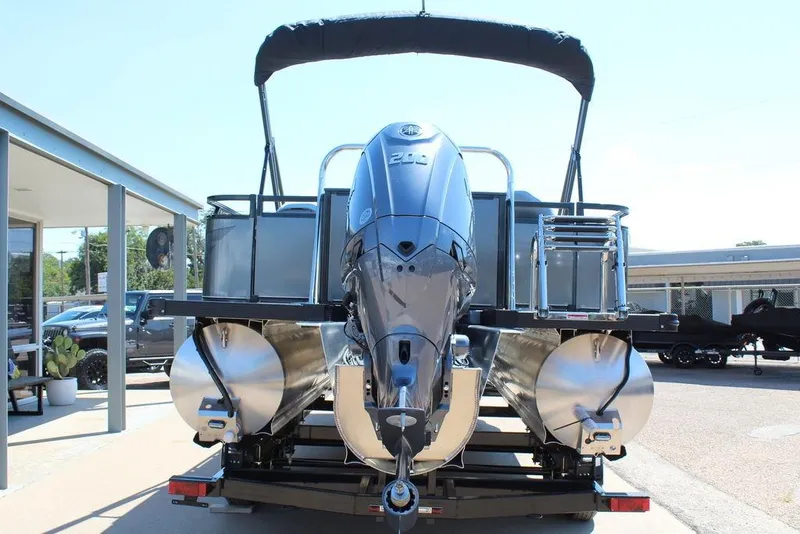 Slide: The Image of 2026 Avalon Venture 85 Center Console Fish boat, 23 FT, rear view with powerful outboard motor. - 2