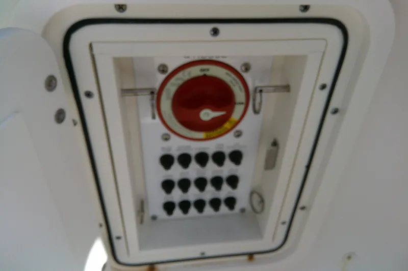 Slide: The Image of Control panel of a 2015 Pursuit DC 235 Dual Console boat. - 32