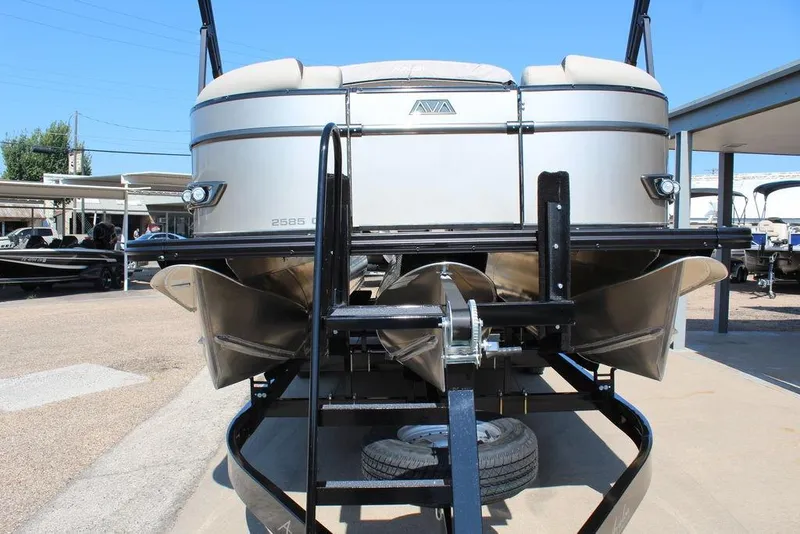 Slide: The Image of 2026 Avalon Catalina Quad Lounger Shift 25 FT pontoon boat on trailer, rear view. - 10