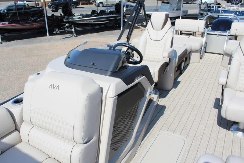 Slide: The Image of 2026 Avalon Catalina Quad Lounger Shift 25 FT interior with luxurious seating and modern helm. - 13