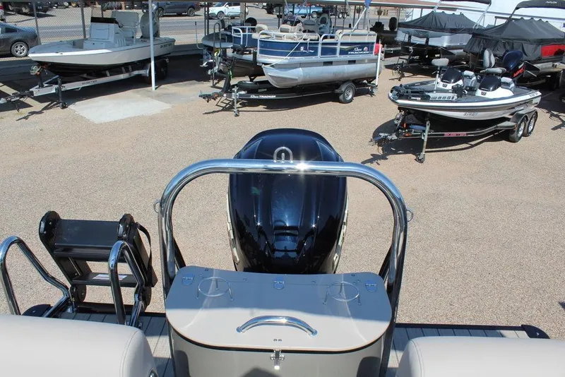 Slide: The Image of 2026 Avalon Catalina Quad Lounger Shift 25 FT at a boat dealership. - 20