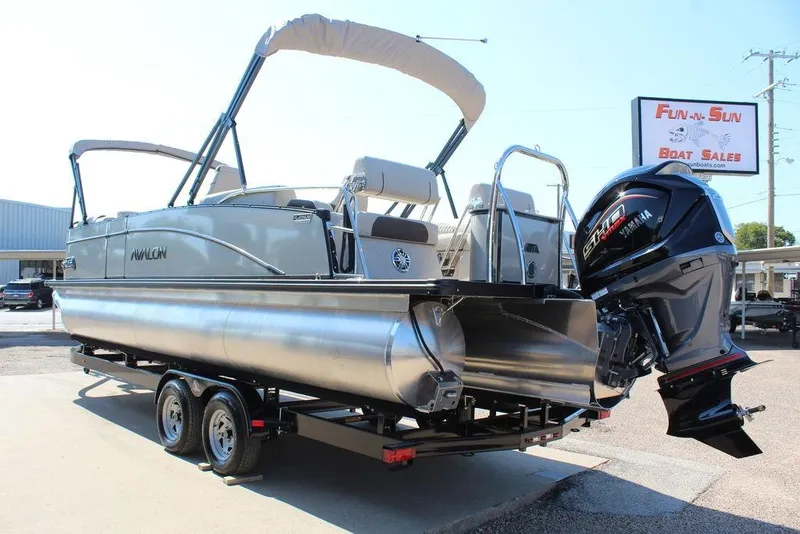 Slide: The Image of 2026 Avalon Catalina Quad Lounger Shift 25 FT pontoon boat at dealership. - 4