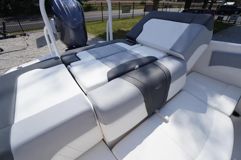 Slide: The Image of 2026 Chaparral 21 SSi OB boat interior with sleek, modern seating design. - 26