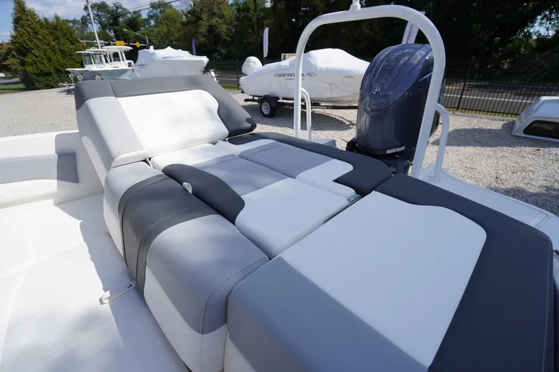Slide: The Image of 2026 Chaparral 21 SSi OB boat with luxurious seating and sleek design. - 27